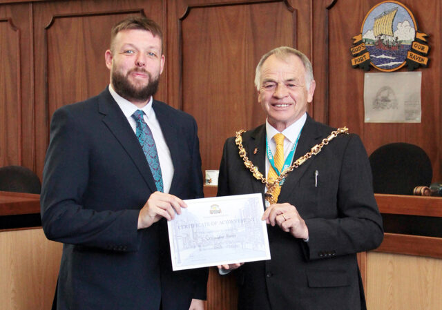 Chris Harris receiving his Gosport 100 Award from Gosport Mayor Jamie Hutchison